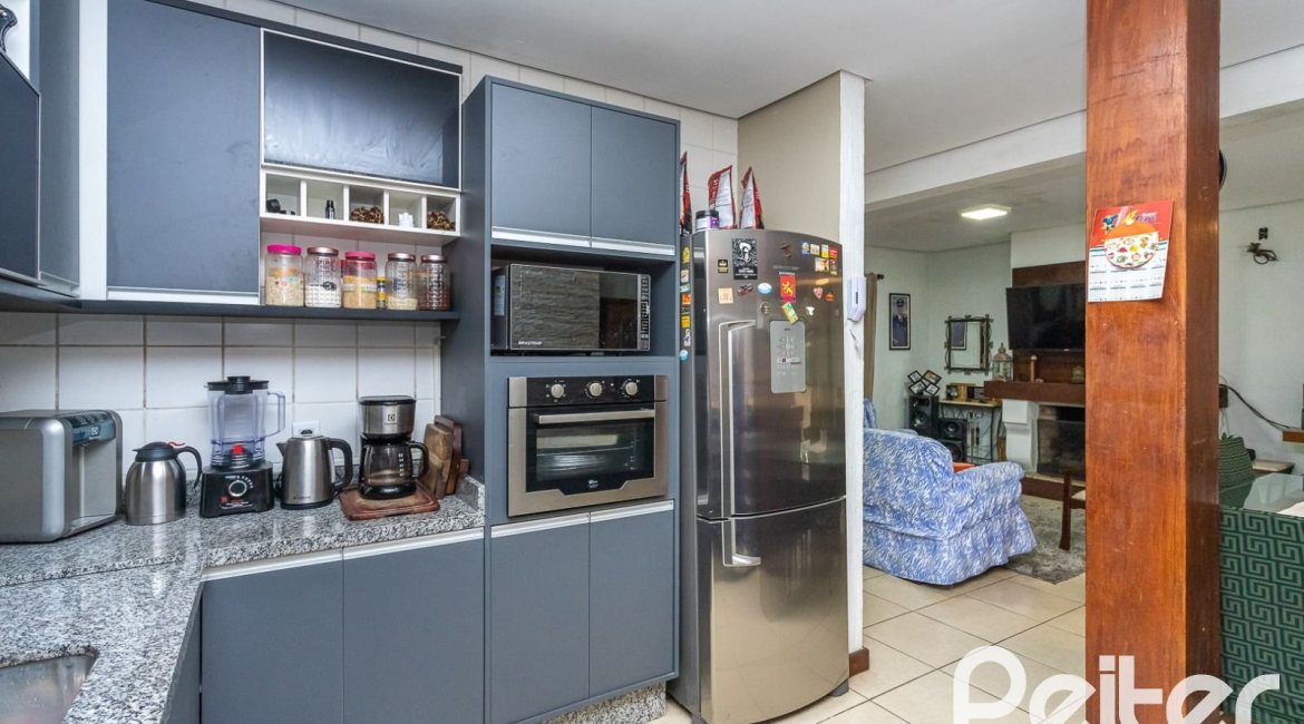 Casa em Condomínio à venda com 239m², 3 dormitórios, 3 suítes, 3 vagas, no bairro Santa Tereza em Porto Alegre