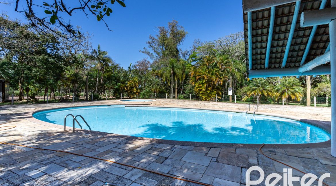 Casa em Condomínio à venda com 294m², 5 dormitórios, 5 suítes, 4 vagas, no bairro Terra Ville em PORTO ALEGRE