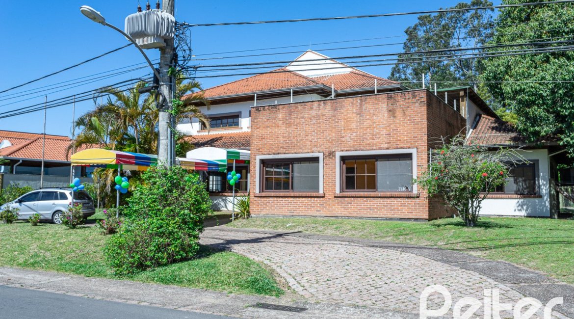 Casa em Condomínio à venda com 294m², 5 dormitórios, 5 suítes, 4 vagas, no bairro Terra Ville em PORTO ALEGRE