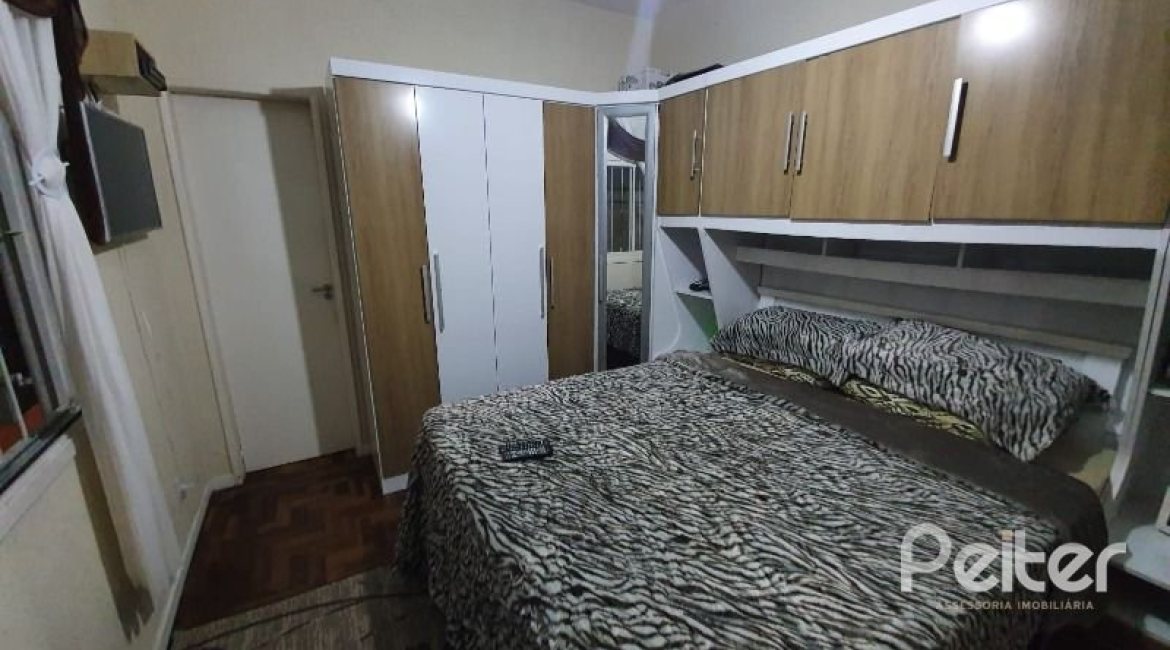 Casa à venda com 210m², 3 dormitórios, 1 suíte, 2 vagas, no bairro Guarujá em Porto Alegre