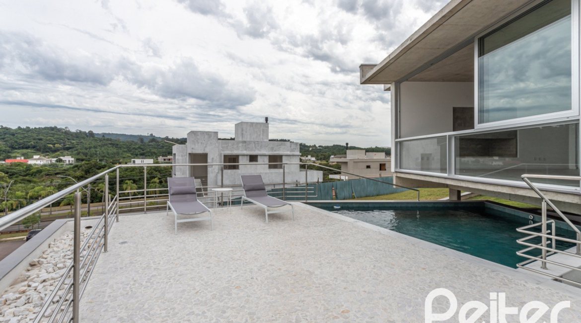 Casa em Condomínio à venda com 315m², 3 dormitórios, 3 suítes, 3 vagas, no bairro Alphaville em PORTO ALEGRE