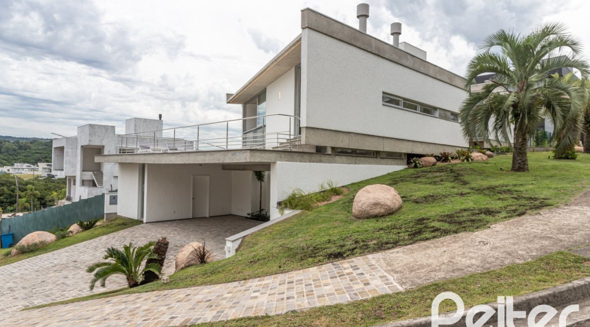 Casa em Condomínio à venda com 315m², 3 dormitórios, 3 suítes, 3 vagas, no bairro Alphaville em PORTO ALEGRE