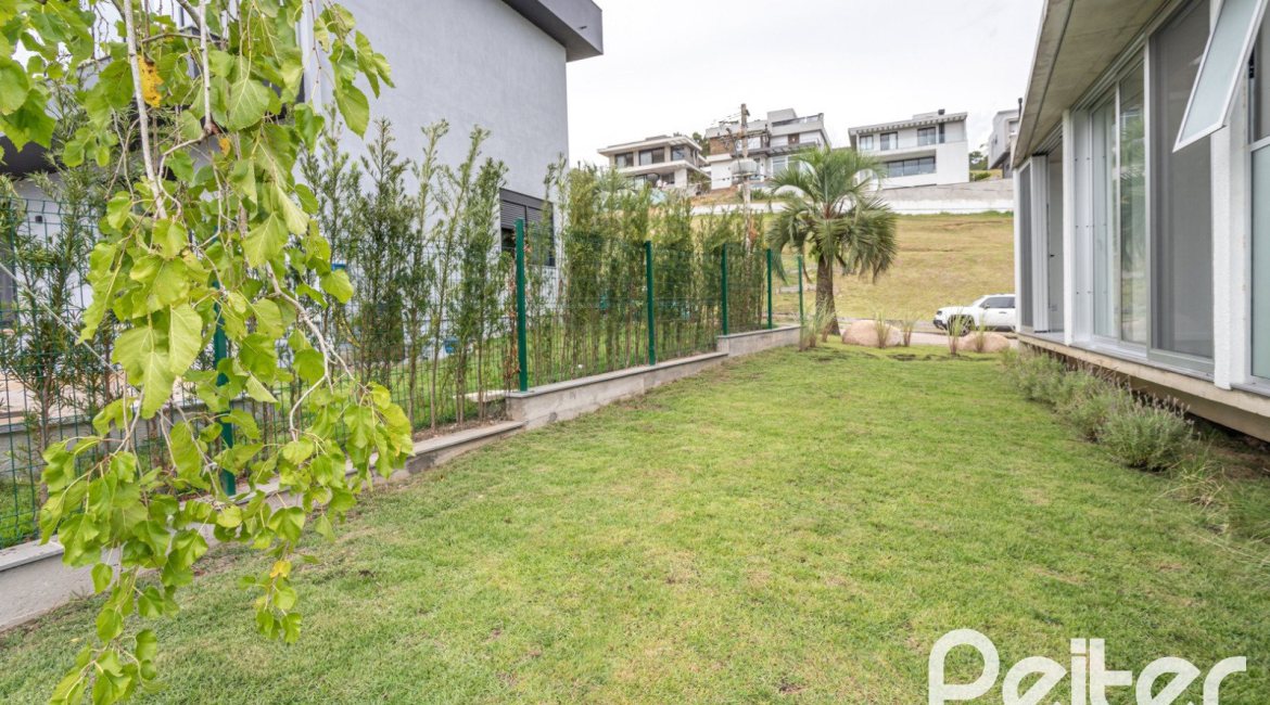 Casa em Condomínio à venda com 315m², 3 dormitórios, 3 suítes, 3 vagas, no bairro Alphaville em PORTO ALEGRE