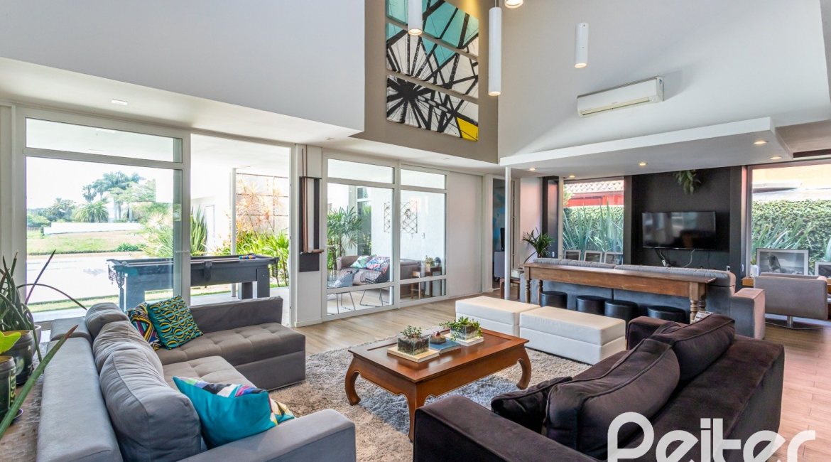 Casa em Condomínio à venda com 418m², 3 dormitórios, 3 suítes, 6 vagas, no bairro Terra Ville em PORTO ALEGRE