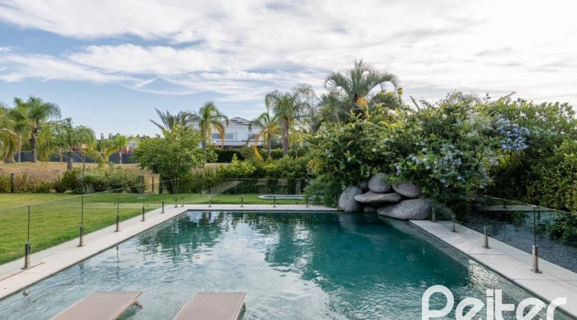 Casa em Condomínio à venda com 550m², 5 dormitórios, 4 suítes, 4 vagas, no bairro Terra Ville em PORTO ALEGRE