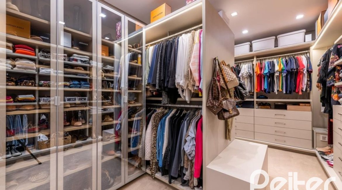 Casa em Condomínio à venda com 550m², 5 dormitórios, 4 suítes, 4 vagas, no bairro Terra Ville em PORTO ALEGRE