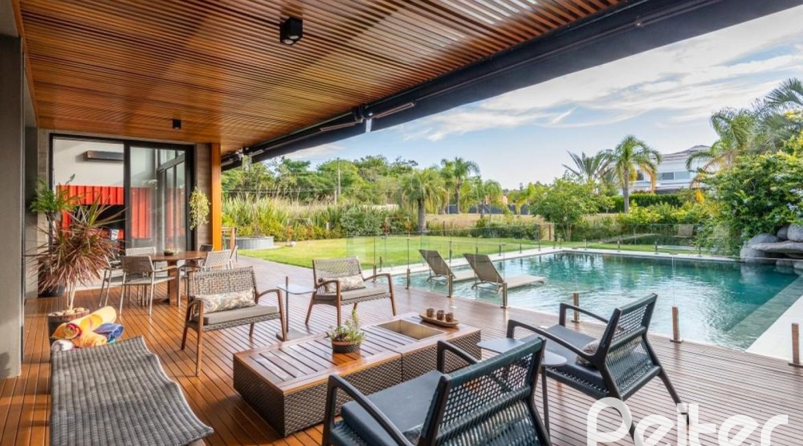 Casa em Condomínio à venda com 550m², 5 dormitórios, 4 suítes, 4 vagas, no bairro Terra Ville em PORTO ALEGRE