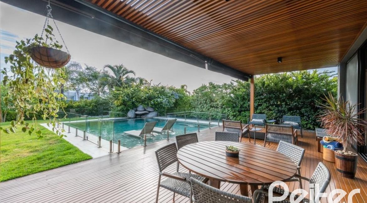 Casa em Condomínio à venda com 550m², 5 dormitórios, 4 suítes, 4 vagas, no bairro Terra Ville em PORTO ALEGRE