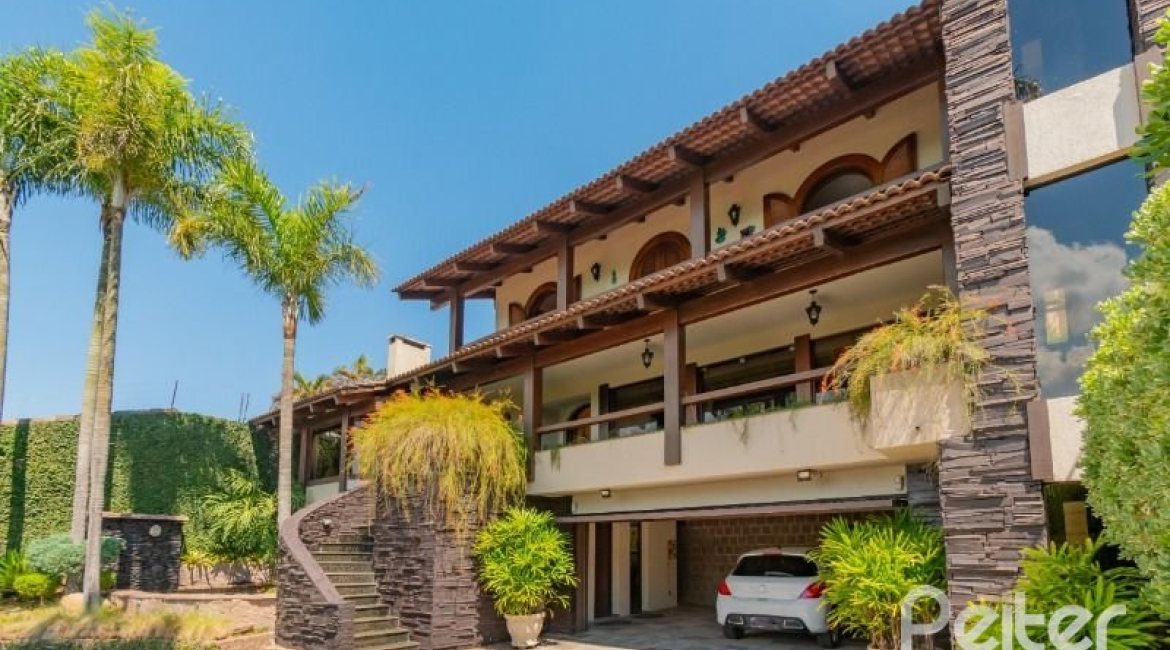 Casa à venda com 430m², 3 dormitórios, 2 suítes, 4 vagas, no bairro Vila Assunção em Porto Alegre