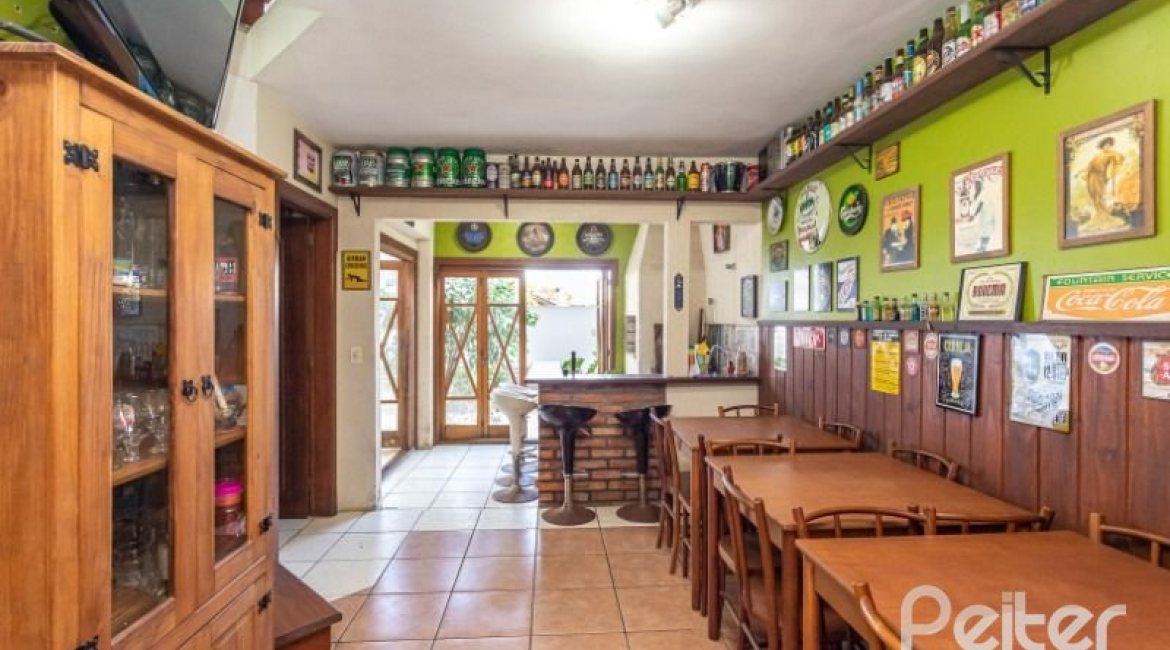 Casa em Condomínio à venda com 255m², 3 dormitórios, 1 suíte, 4 vagas, no bairro Jardim Isabel em Porto Alegre