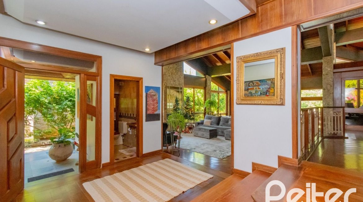 Casa em Condomínio à venda com 600m², 4 dormitórios, 2 suítes, 5 vagas, no bairro Cavalhada em PORTO ALEGRE