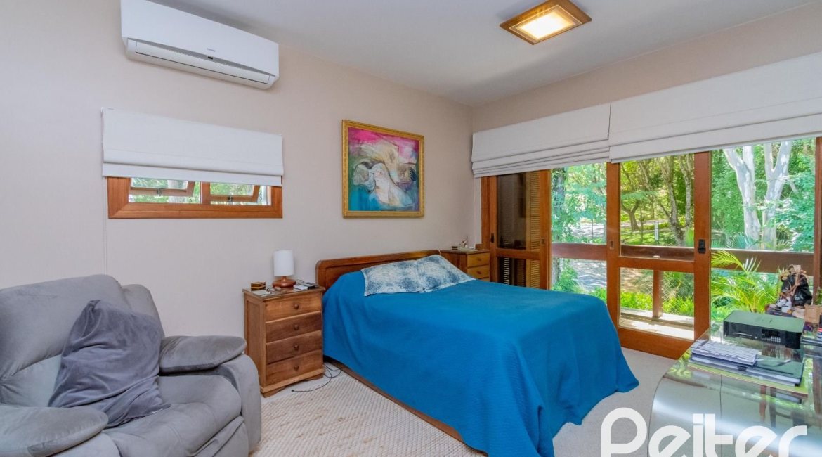 Casa em Condomínio à venda com 600m², 4 dormitórios, 2 suítes, 5 vagas, no bairro Cavalhada em PORTO ALEGRE