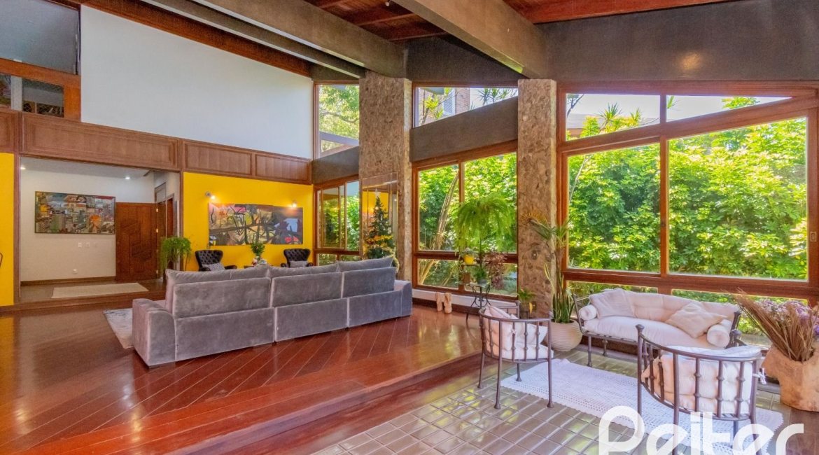 Casa em Condomínio à venda com 600m², 4 dormitórios, 2 suítes, 5 vagas, no bairro Cavalhada em PORTO ALEGRE