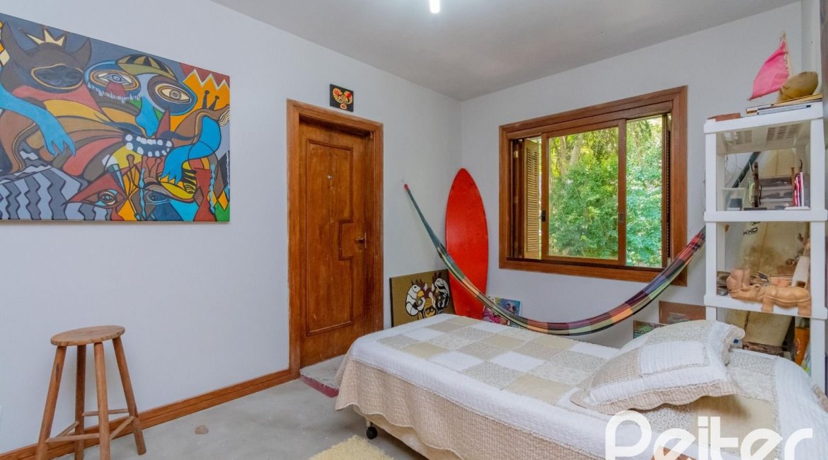 Casa em Condomínio à venda com 600m², 4 dormitórios, 2 suítes, 5 vagas, no bairro Cavalhada em PORTO ALEGRE