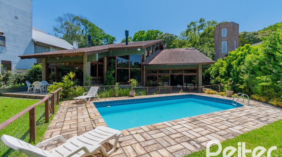 Casa em Condomínio à venda com 600m², 4 dormitórios, 2 suítes, 5 vagas, no bairro Cavalhada em PORTO ALEGRE