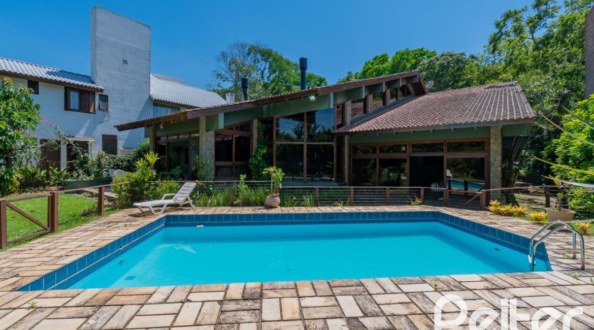 Casa em Condomínio à venda com 600m², 4 dormitórios, 2 suítes, 5 vagas, no bairro Cavalhada em PORTO ALEGRE