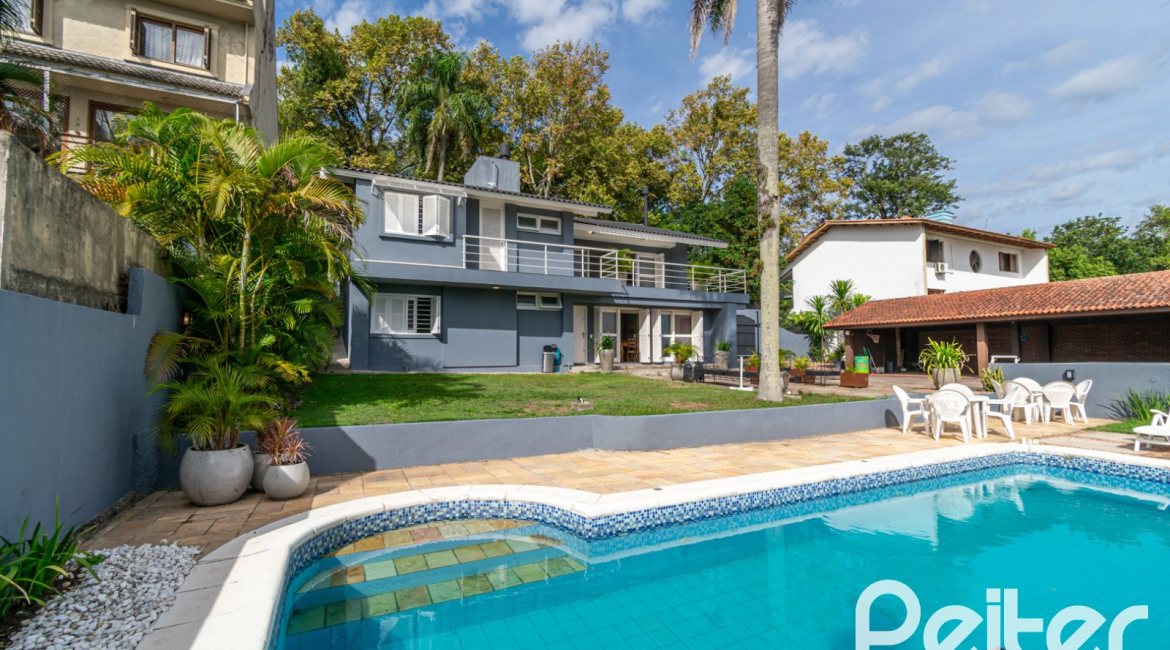 Casa à venda com 312m², 5 dormitórios, 5 suítes, 5 vagas, no bairro Vila Conceição em Porto Alegre
