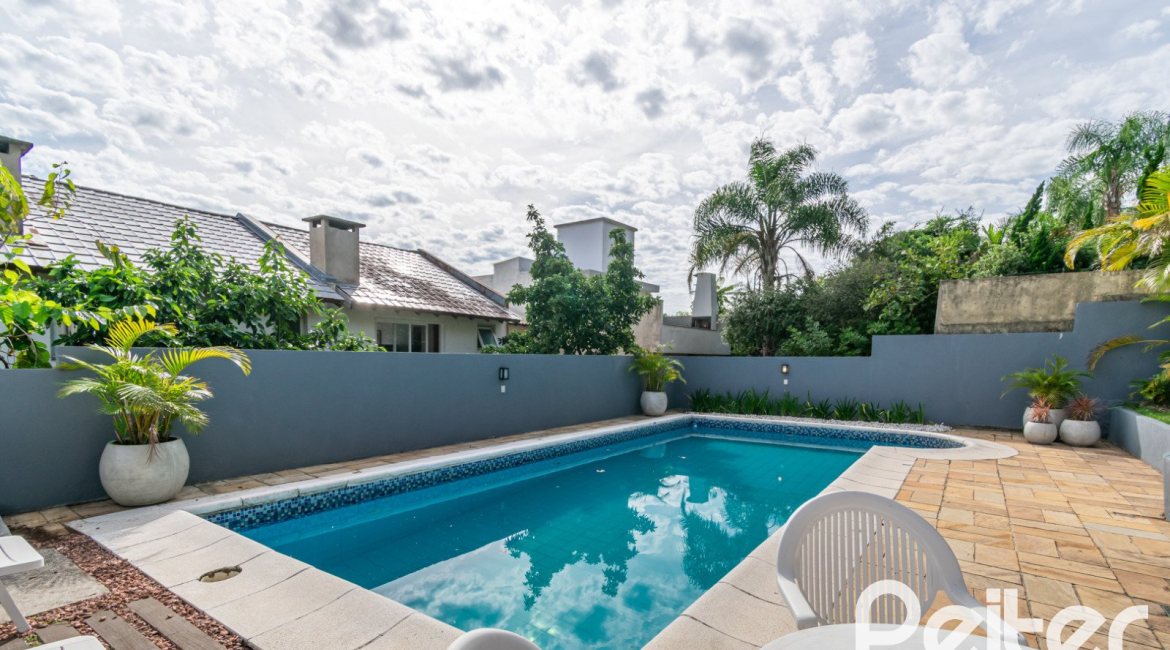 Casa à venda com 312m², 5 dormitórios, 5 suítes, 5 vagas, no bairro Vila Conceição em Porto Alegre