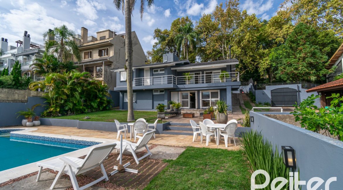 Casa à venda com 312m², 5 dormitórios, 5 suítes, 5 vagas, no bairro Vila Conceição em Porto Alegre