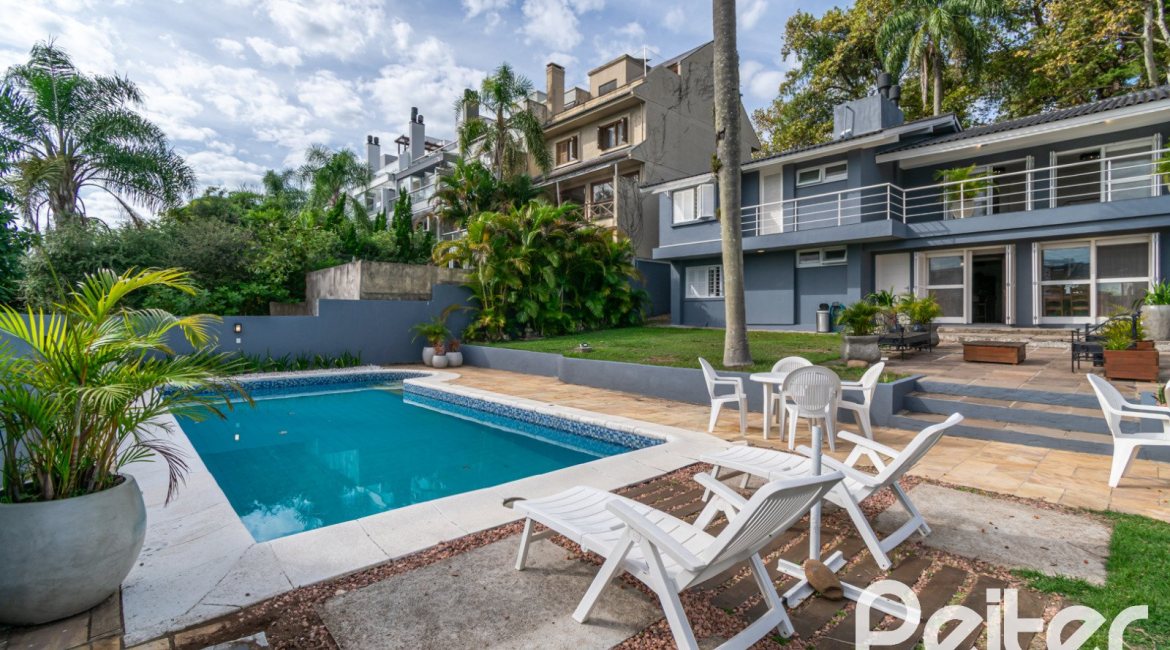 Casa à venda com 312m², 5 dormitórios, 5 suítes, 5 vagas, no bairro Vila Conceição em Porto Alegre