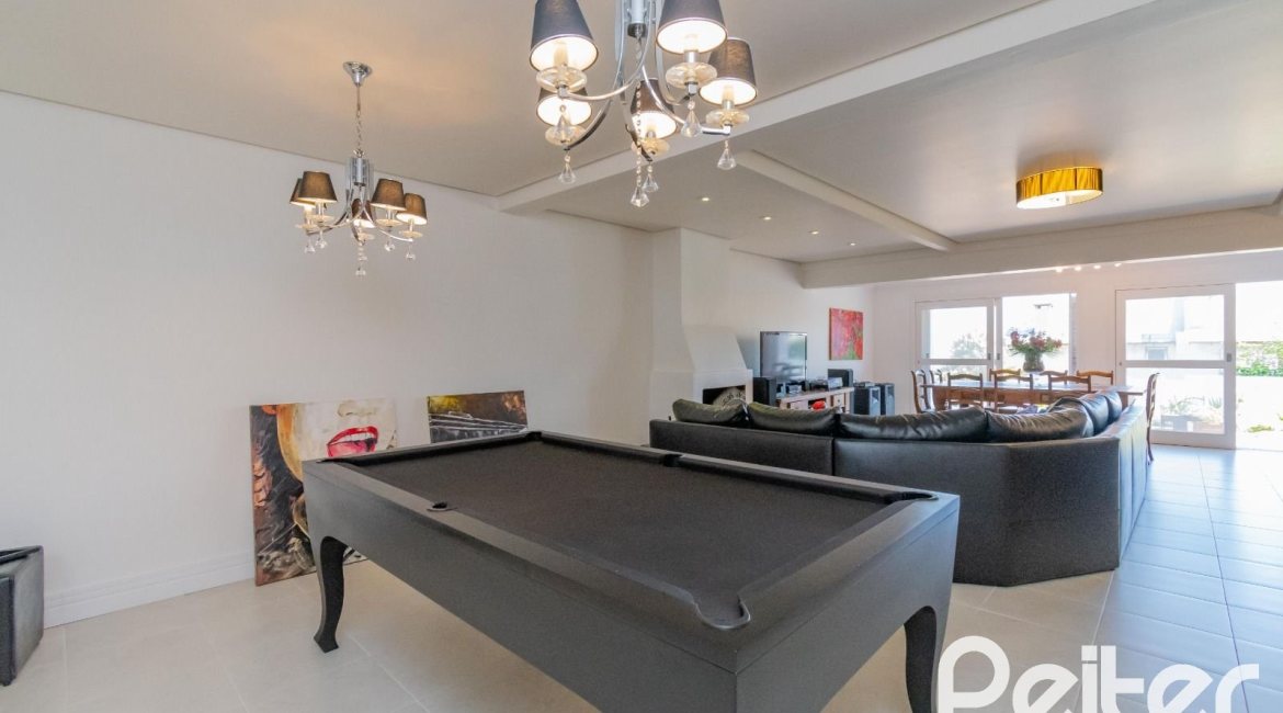 Casa à venda com 312m², 5 dormitórios, 5 suítes, 5 vagas, no bairro Vila Conceição em Porto Alegre