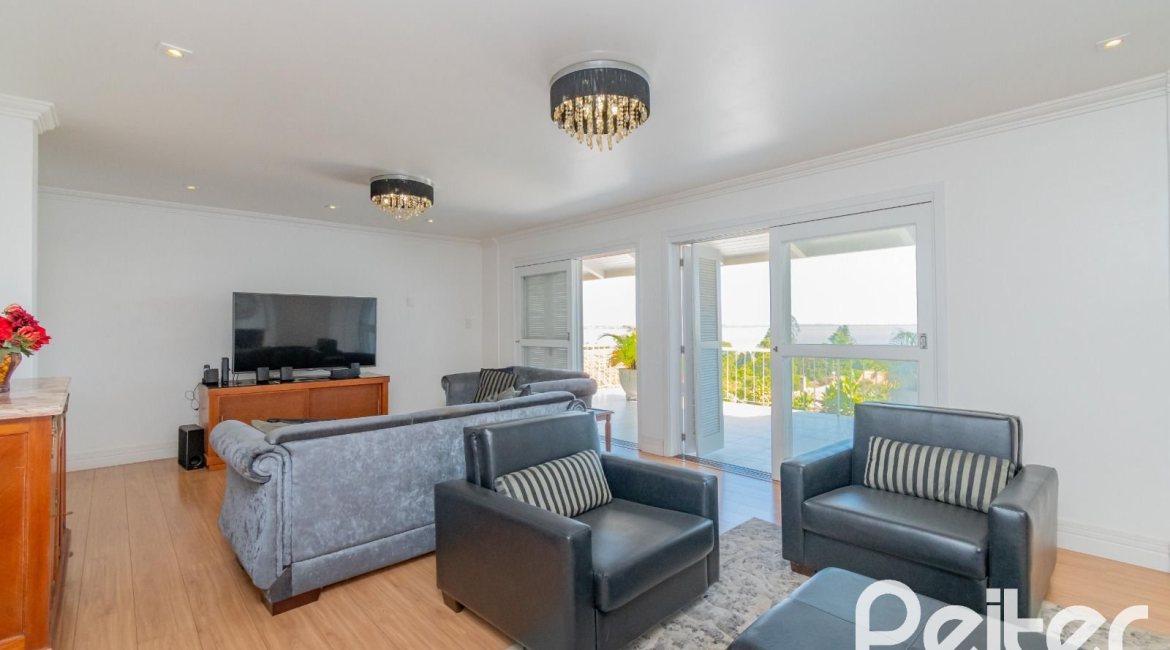 Casa à venda com 312m², 5 dormitórios, 5 suítes, 5 vagas, no bairro Vila Conceição em Porto Alegre