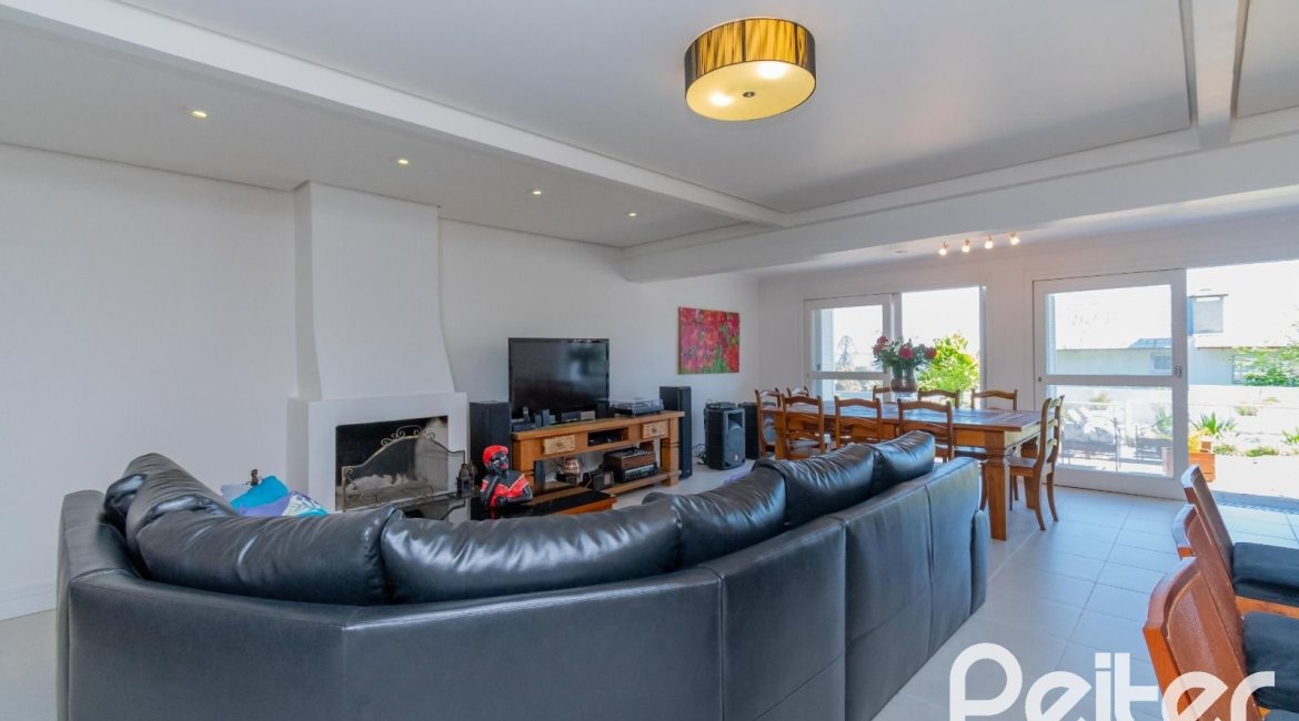 Casa à venda com 312m², 5 dormitórios, 5 suítes, 5 vagas, no bairro Vila Conceição em Porto Alegre