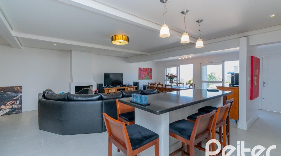 Casa à venda com 312m², 5 dormitórios, 5 suítes, 5 vagas, no bairro Vila Conceição em Porto Alegre