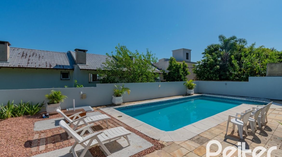 Casa à venda com 312m², 5 dormitórios, 5 suítes, 5 vagas, no bairro Vila Conceição em Porto Alegre