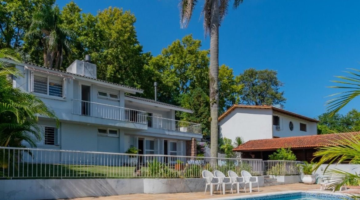 Casa à venda com 312m², 5 dormitórios, 5 suítes, 5 vagas, no bairro Vila Conceição em Porto Alegre