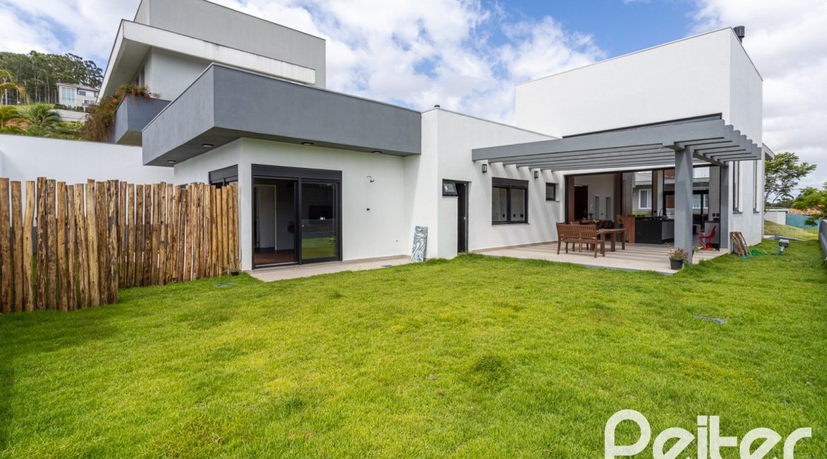 Casa em Condomínio à venda com 270m², 3 dormitórios, 3 suítes, 3 vagas, no bairro Alphaville em PORTO ALEGRE