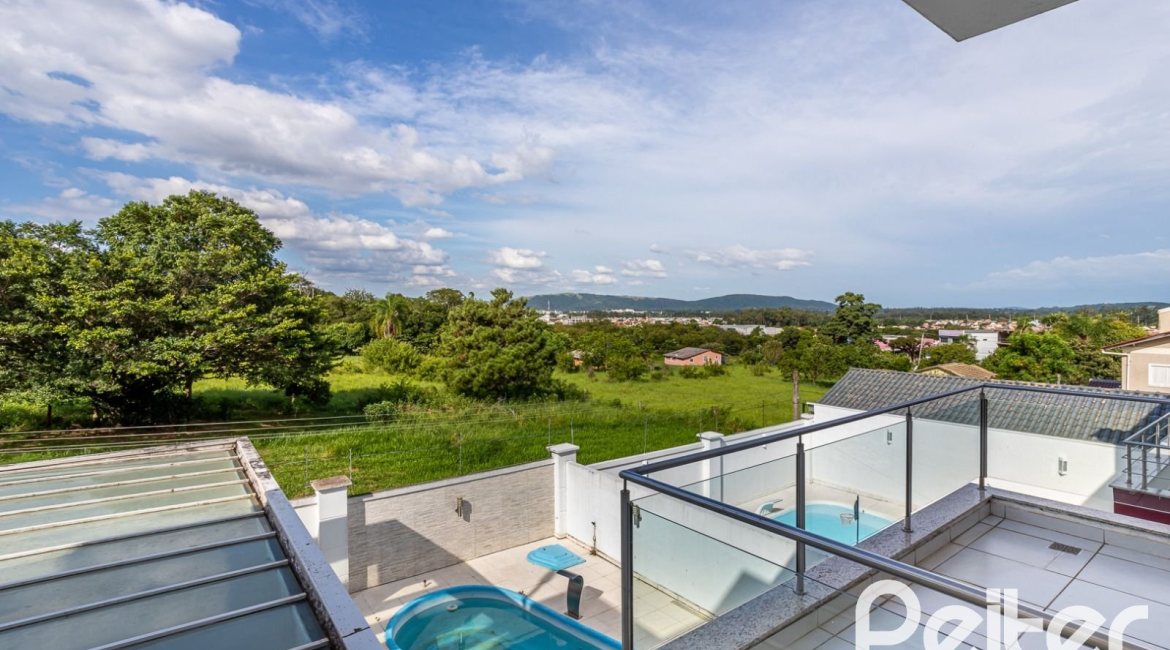 Casa em Condomínio à venda com 245m², 3 dormitórios, 3 suítes, 4 vagas, no bairro Mountain Ville em PORTO ALEGRE