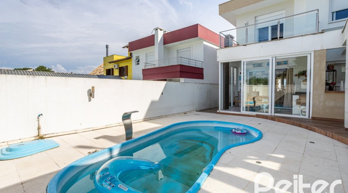 Casa em Condomínio à venda com 245m², 3 dormitórios, 3 suítes, 4 vagas, no bairro Mountain Ville em PORTO ALEGRE