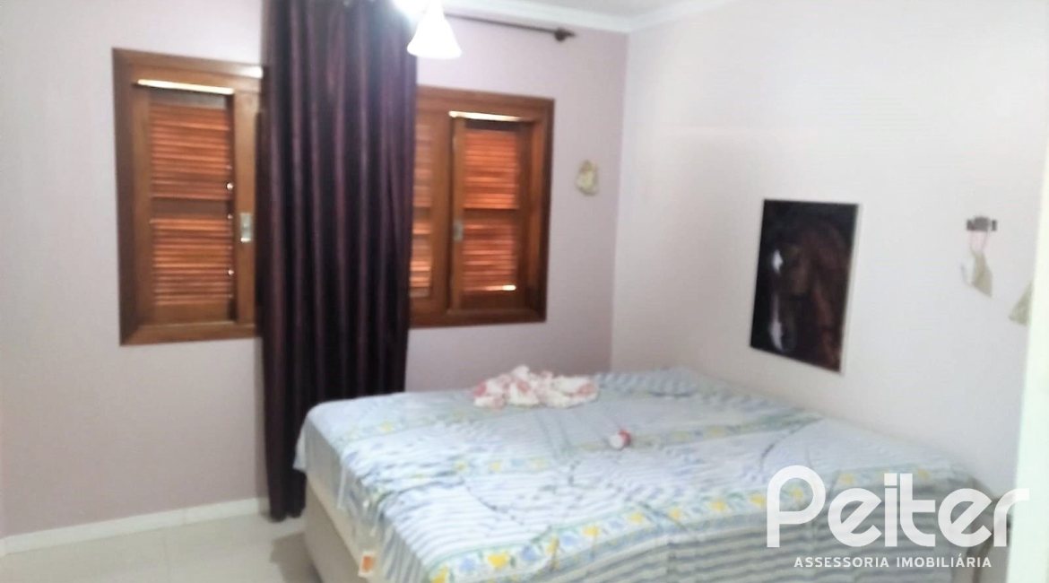 Casa à venda com 160m², 3 dormitórios, 3 suítes, 7 vagas, no bairro Centro em Tramandaí