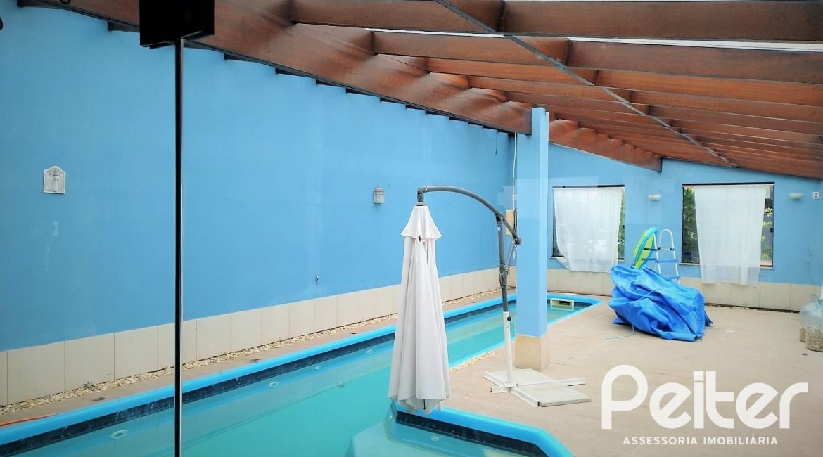 Casa à venda com 160m², 3 dormitórios, 3 suítes, 7 vagas, no bairro Centro em Tramandaí