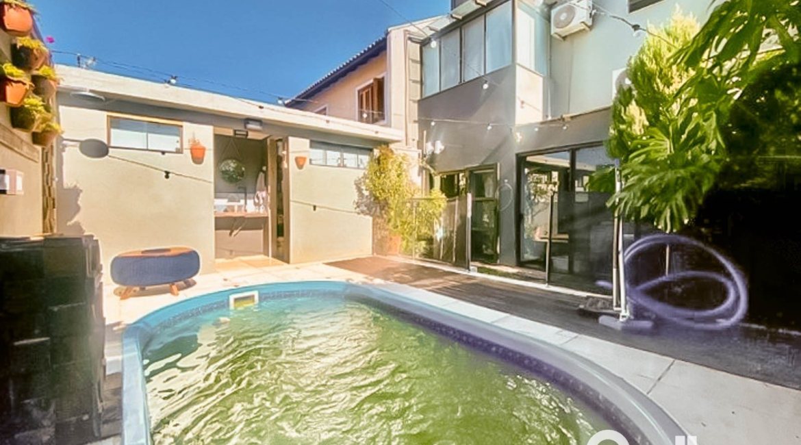 Casa em Condomínio à venda com 166m², 3 dormitórios, 2 suítes, 1 vaga, no bairro Hípica em Porto Alegre