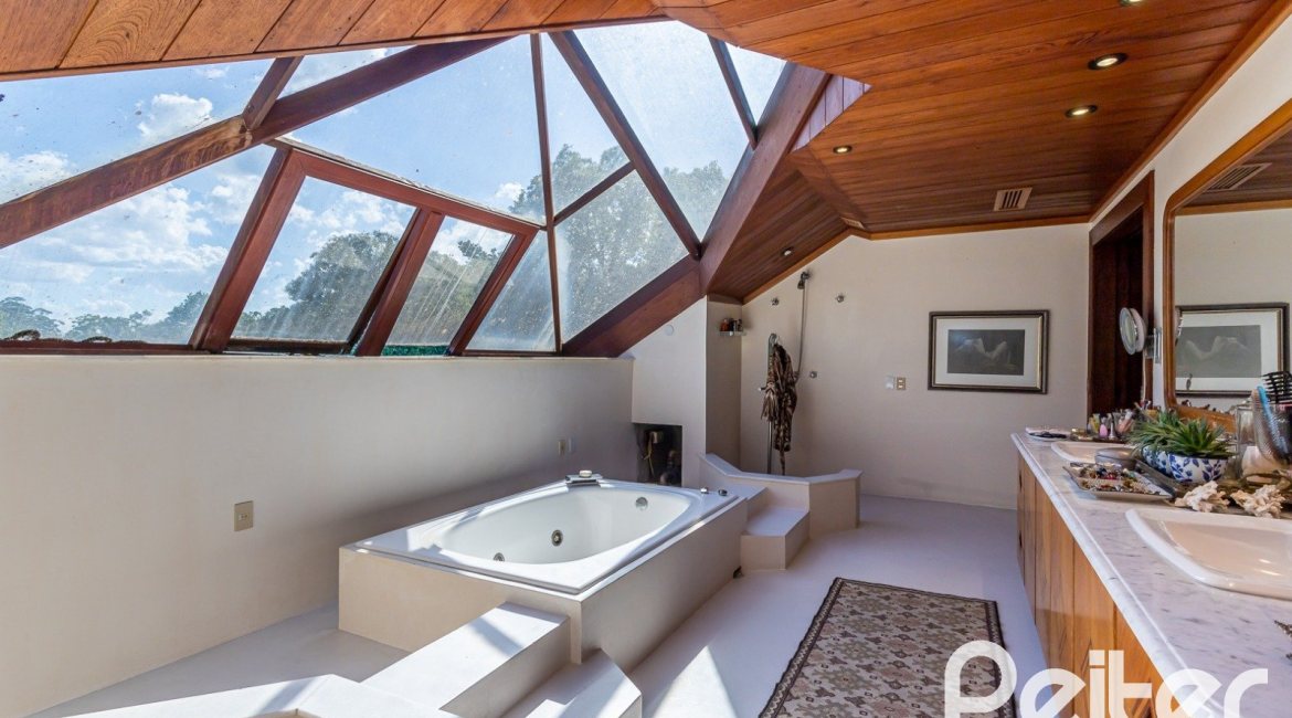 Casa em Condomínio à venda com 789m², 5 dormitórios, 3 suítes, 5 vagas, no bairro Cavalhada em PORTO ALEGRE