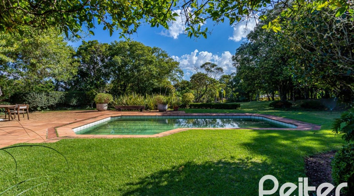 Casa em Condomínio à venda com 789m², 5 dormitórios, 3 suítes, 5 vagas, no bairro Cavalhada em PORTO ALEGRE