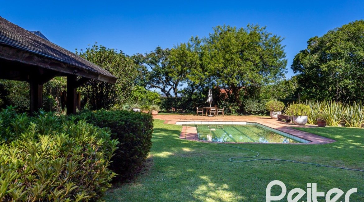 Casa em Condomínio à venda com 789m², 5 dormitórios, 3 suítes, 5 vagas, no bairro Cavalhada em PORTO ALEGRE