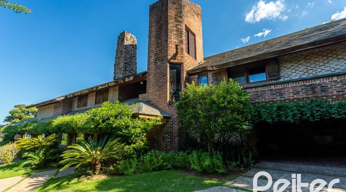 Casa em Condomínio à venda com 789m², 5 dormitórios, 3 suítes, 5 vagas, no bairro Cavalhada em PORTO ALEGRE