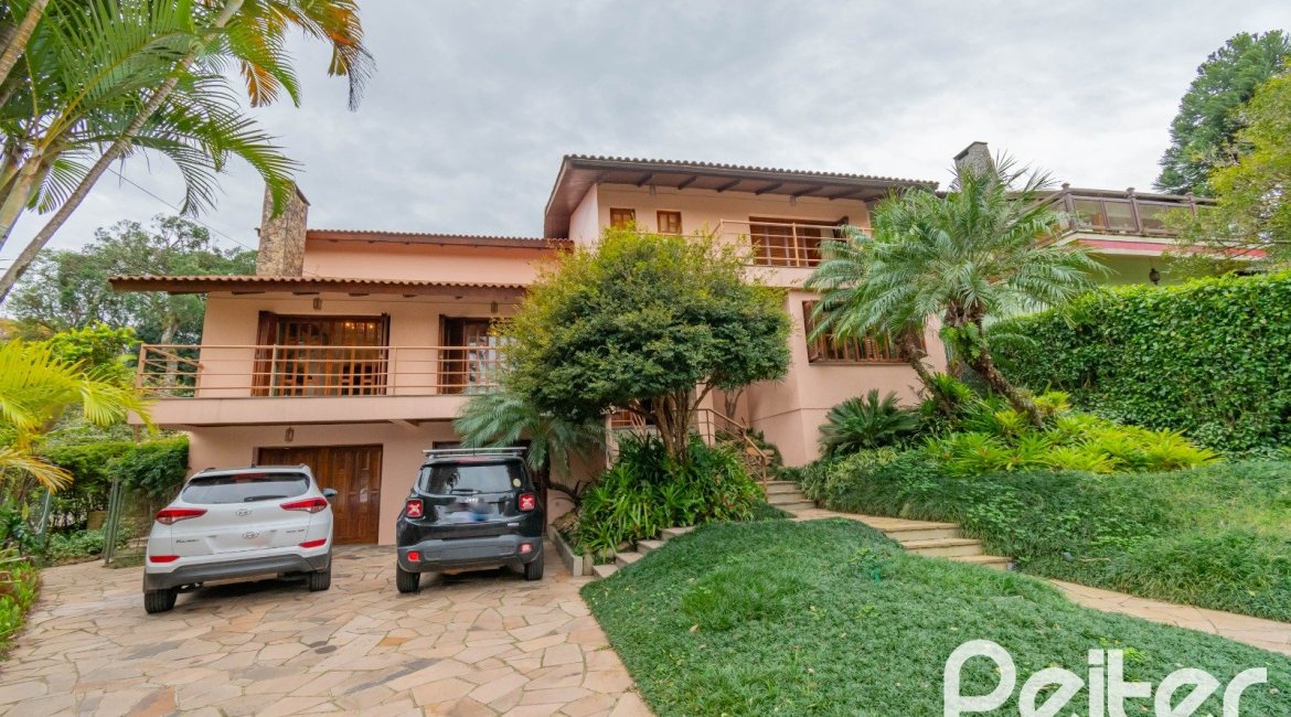 Casa em Condomínio à venda com 420m², 5 dormitórios, 2 suítes, 2 vagas, no bairro Cavalhada em PORTO ALEGRE
