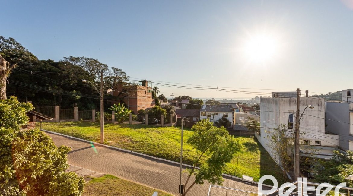 Casa em Condomínio à venda com 161m², 2 dormitórios, 2 suítes, 2 vagas, no bairro Vila Nova em PORTO ALEGRE