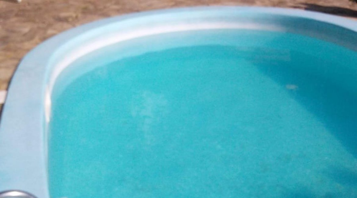 Casa à venda com 400m², 7 dormitórios, 1 suíte, 5 vagas, no bairro Vila Assunção em Porto Alegre