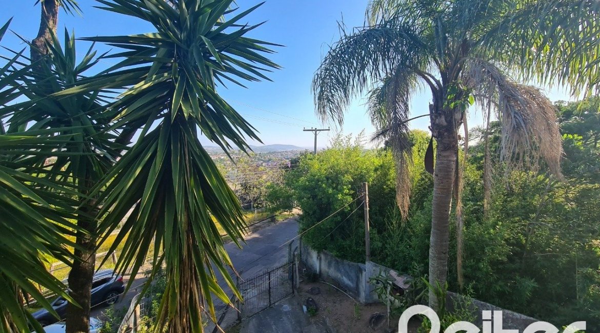 Casa à venda com 510m², 4 dormitórios, 4 vagas, no bairro Vila Nova em Porto Alegre