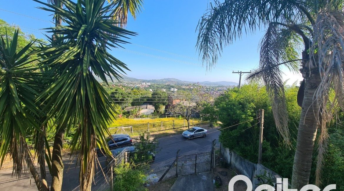 Casa à venda com 510m², 4 dormitórios, 4 vagas, no bairro Vila Nova em Porto Alegre