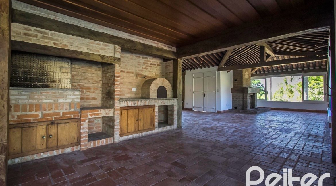 Casa em Condomínio à venda com 830m², 7 dormitórios, 3 suítes, 10 vagas, no bairro Cavalhada em PORTO ALEGRE