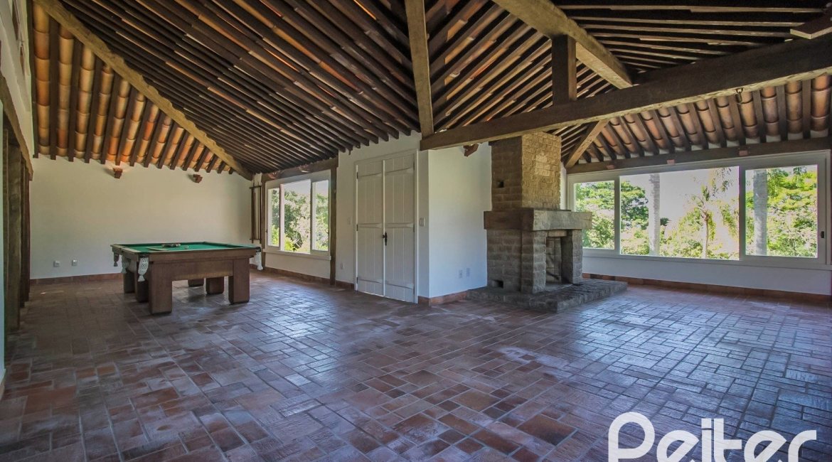 Casa em Condomínio à venda com 830m², 7 dormitórios, 3 suítes, 10 vagas, no bairro Cavalhada em PORTO ALEGRE