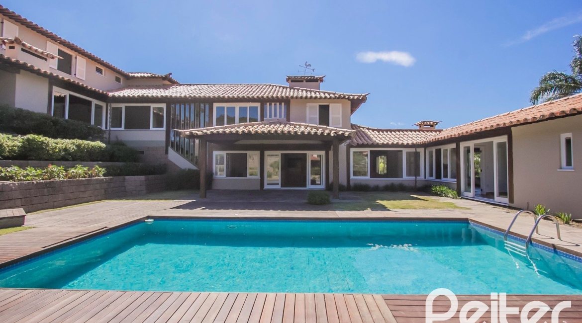 Casa em Condomínio à venda com 830m², 7 dormitórios, 3 suítes, 10 vagas, no bairro Cavalhada em PORTO ALEGRE