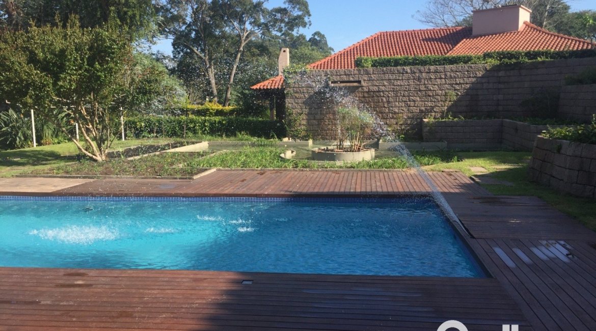 Casa em Condomínio à venda com 830m², 7 dormitórios, 3 suítes, 10 vagas, no bairro Cavalhada em PORTO ALEGRE