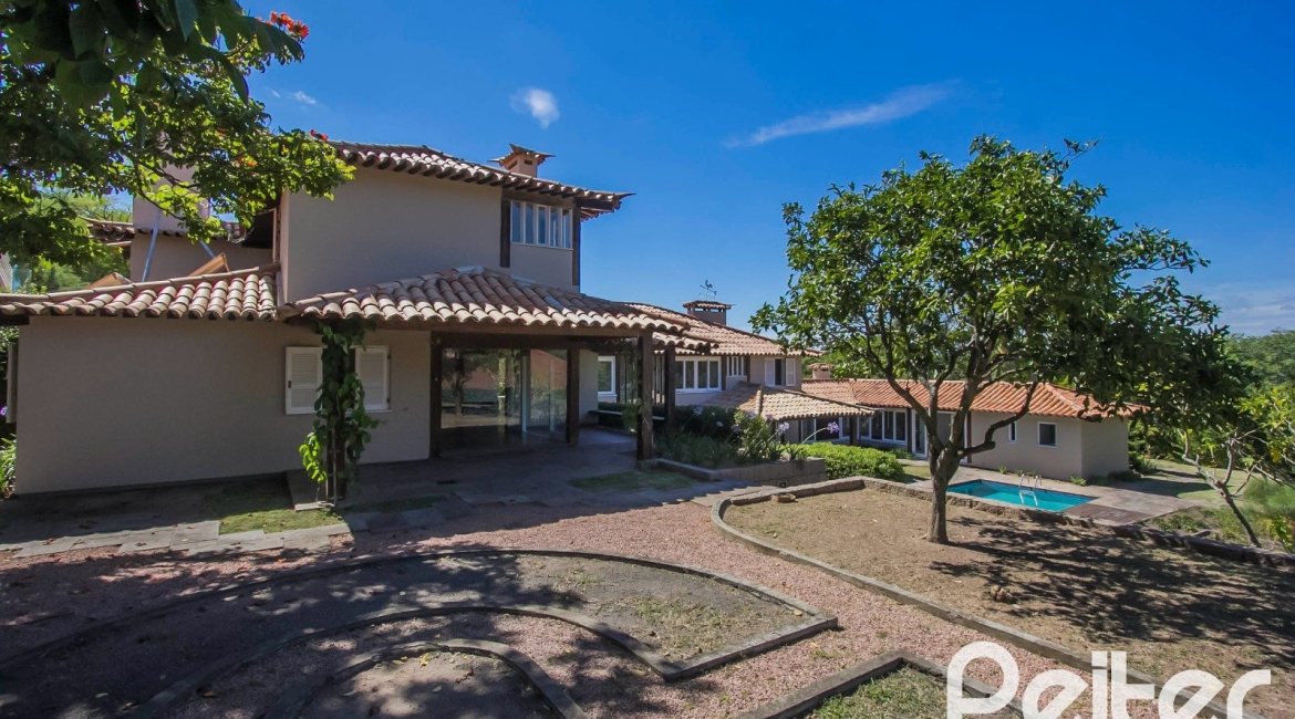 Casa em Condomínio à venda com 830m², 7 dormitórios, 3 suítes, 10 vagas, no bairro Cavalhada em PORTO ALEGRE